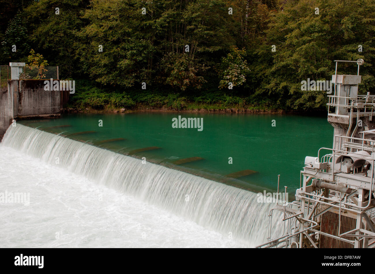 Small hydroelectric power plant, built on scenic river near the town of