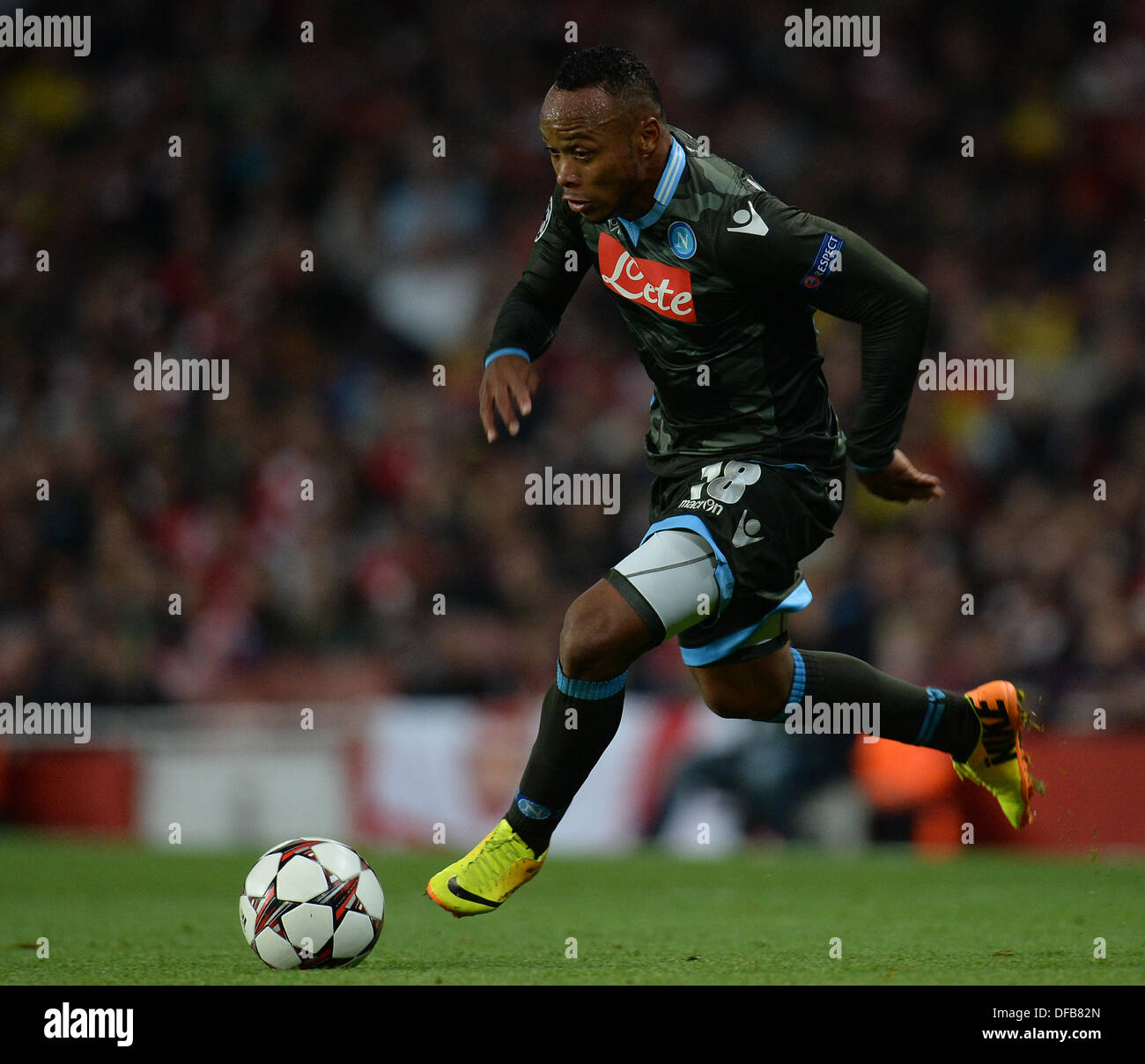 London, UK. 01st Oct, 2013. Napoli's defender Camilo Zuniga from Columbia runs with the ball during the UEFA Champions League match between Arsenal from England and Napoli from Italy played at The Emirates Stadium, on October 01, 2013 in London, England. © Mitchell Gunn/ESPA/Alamy Live News Stock Photo