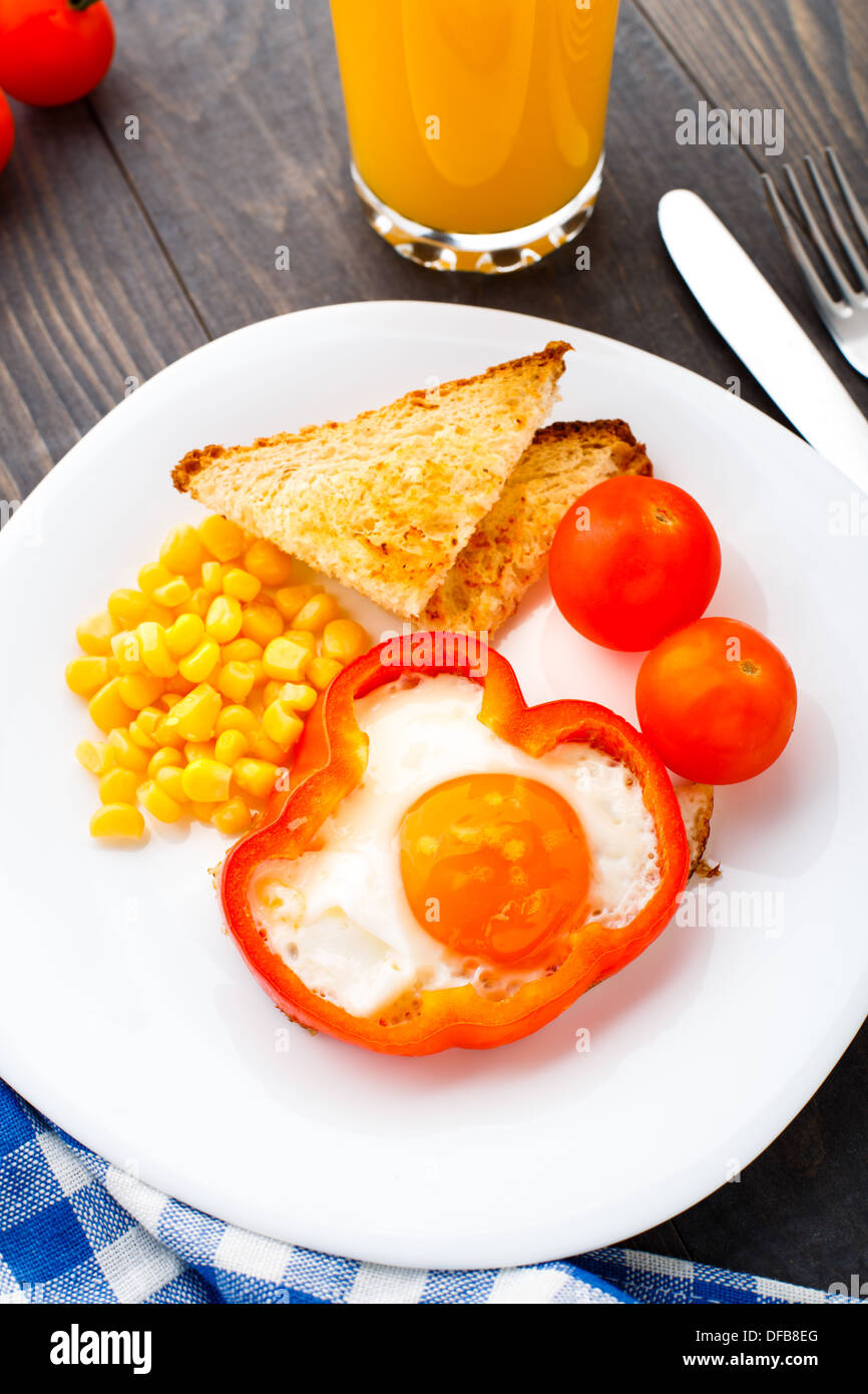 Fried egg in sweet paprika Stock Photo Alamy