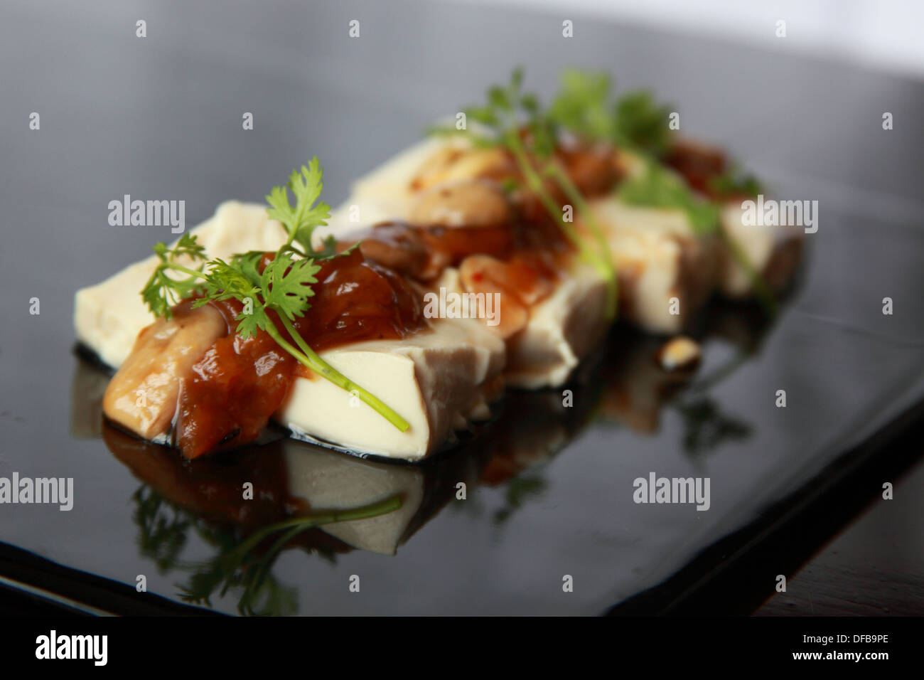 Tofu with plum sauce Stock Photo Alamy