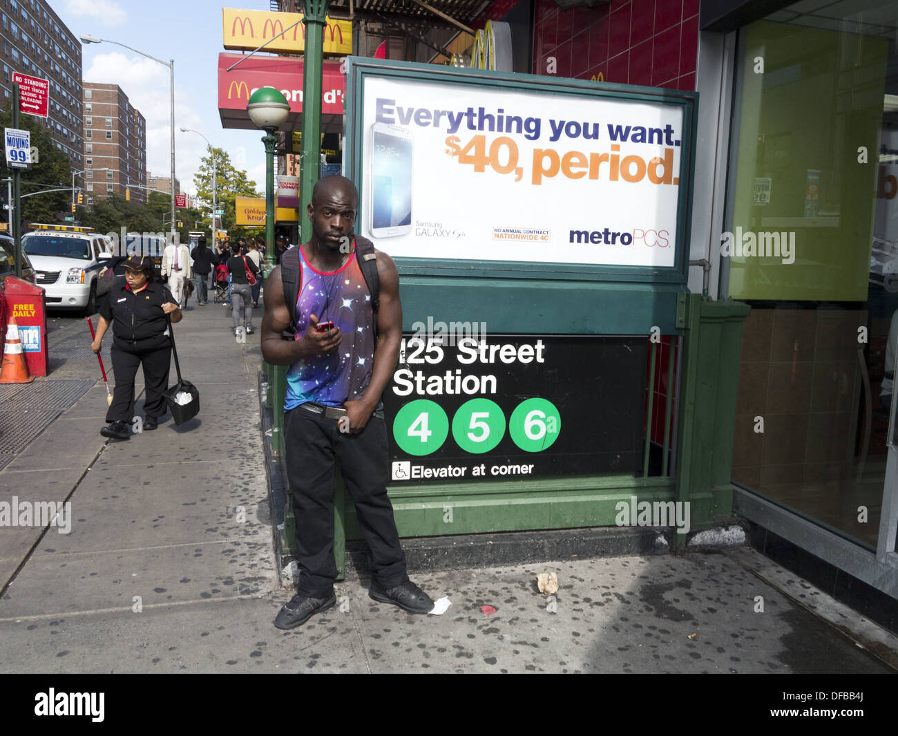 Street scene, E.125th St. and Lexington Ave. in the Harlem section of NYC, NY, 2013. Stock Photo
