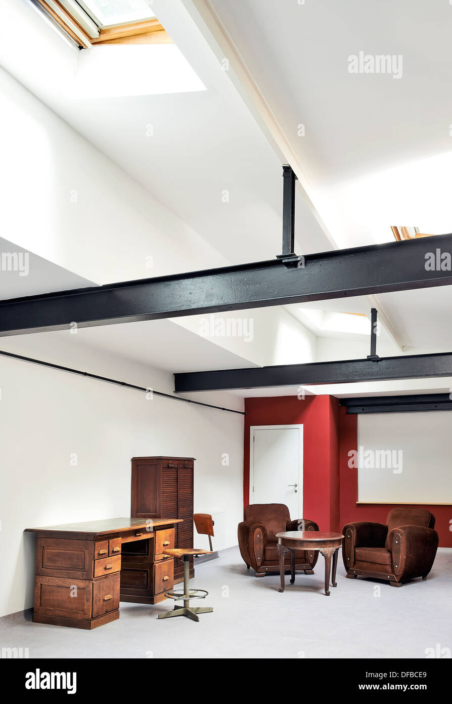 loft apartment interior with desk and chairs Stock Photo