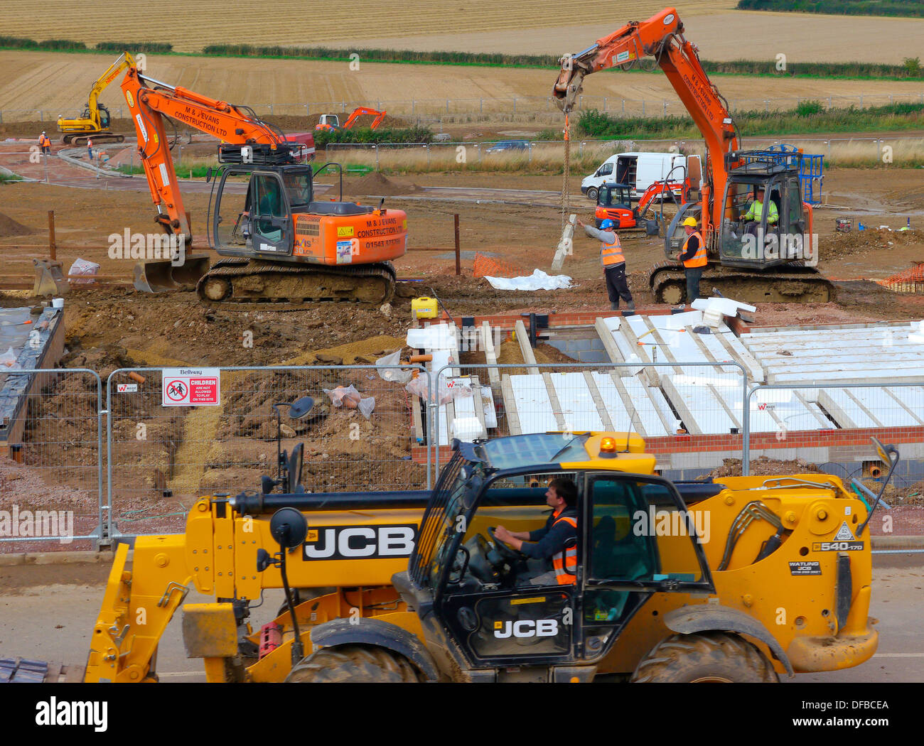 Heavy machinery being used during housing construction, Grantham, Lincolnshire Stock Photo