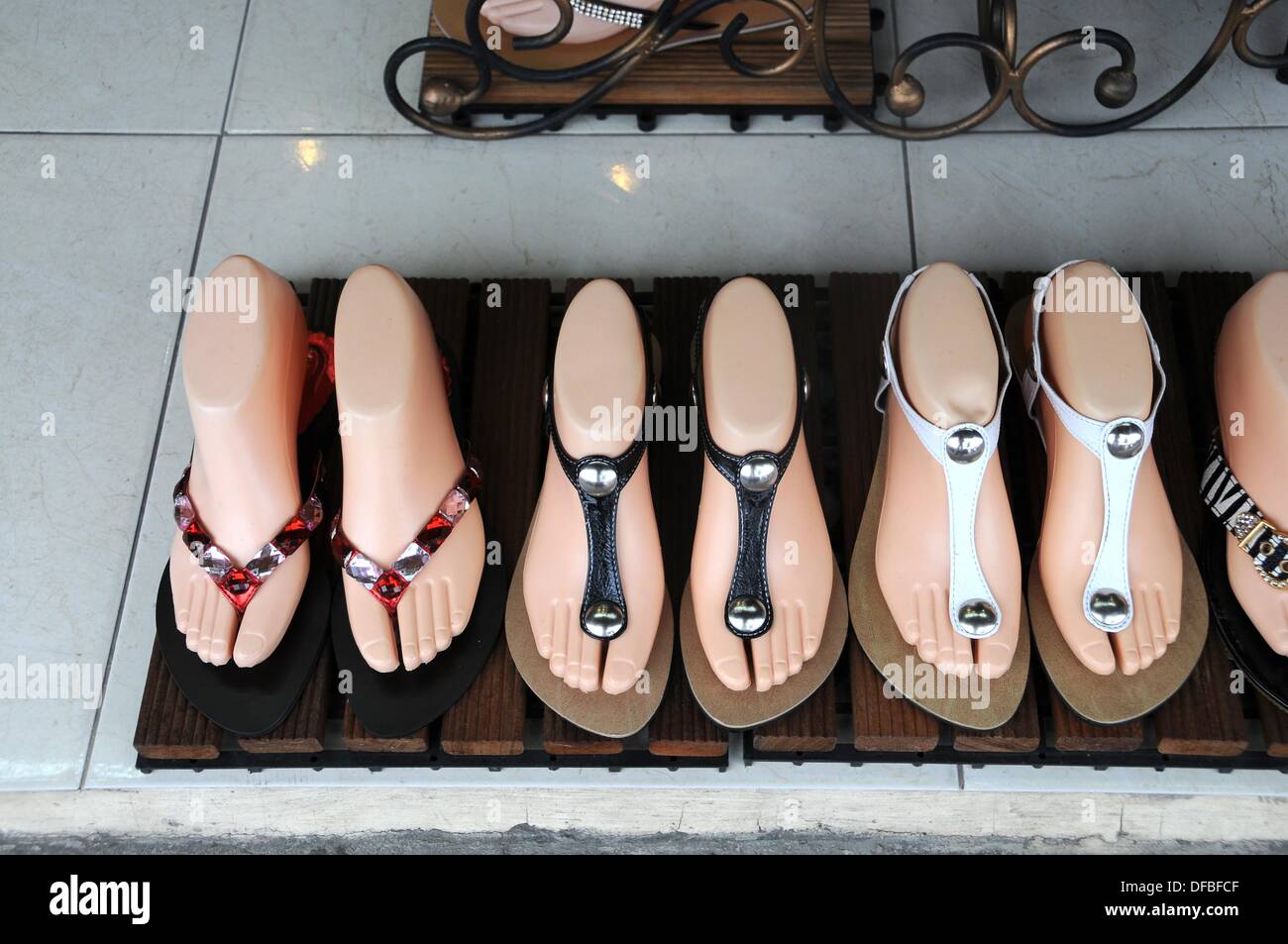 Models with exclusive ladies sandals in a New York shop window Stock Photo  - Alamy