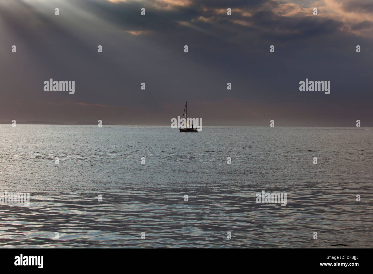 Sailing on a calm evening at Blakeney Point Norfolk Stock Photo