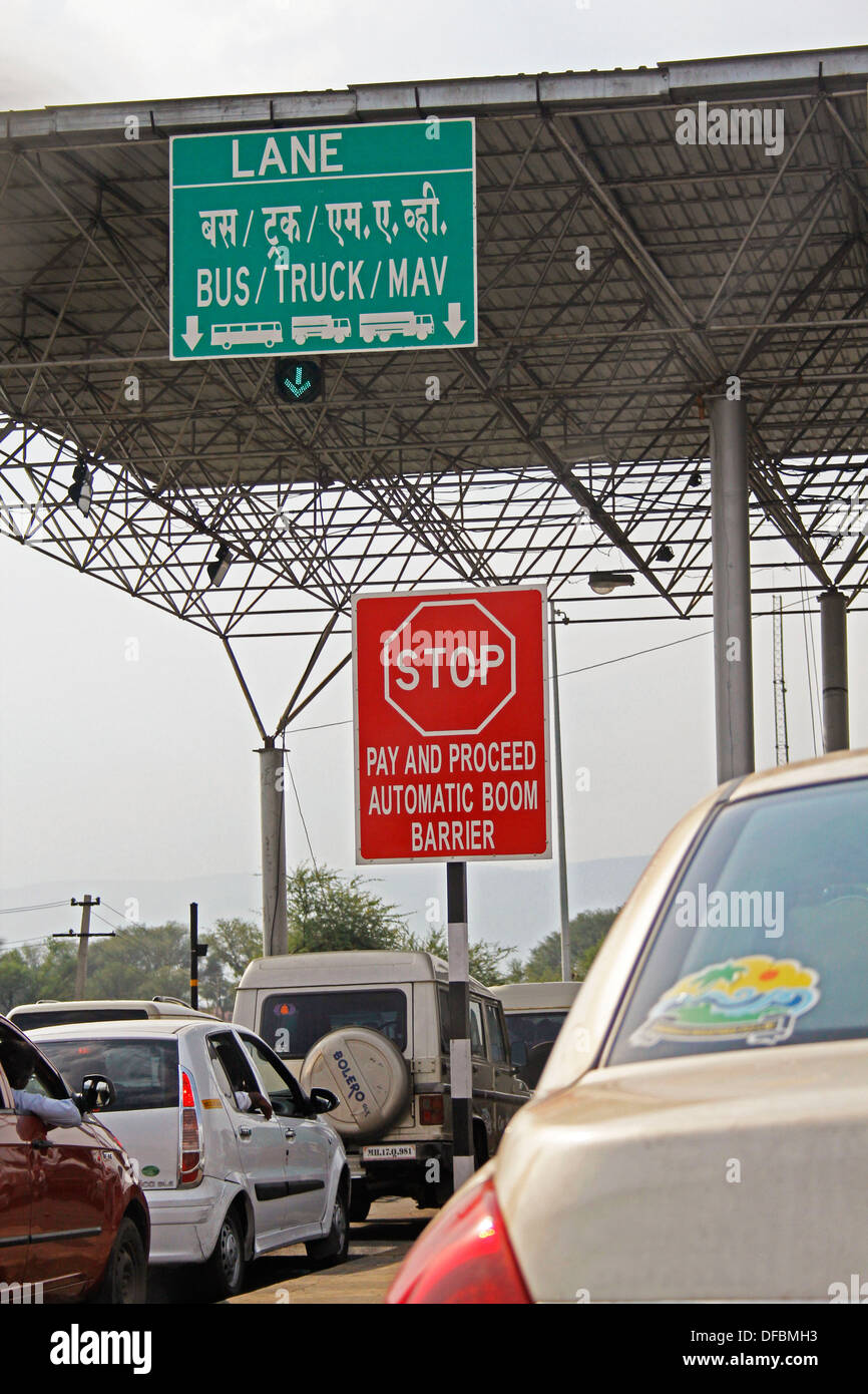 Red Stop Signal With A Sign Board Showing Lane Number For Trucks And Red Stop Signal With A Sign Board Showing Lane Number For Trucks And
