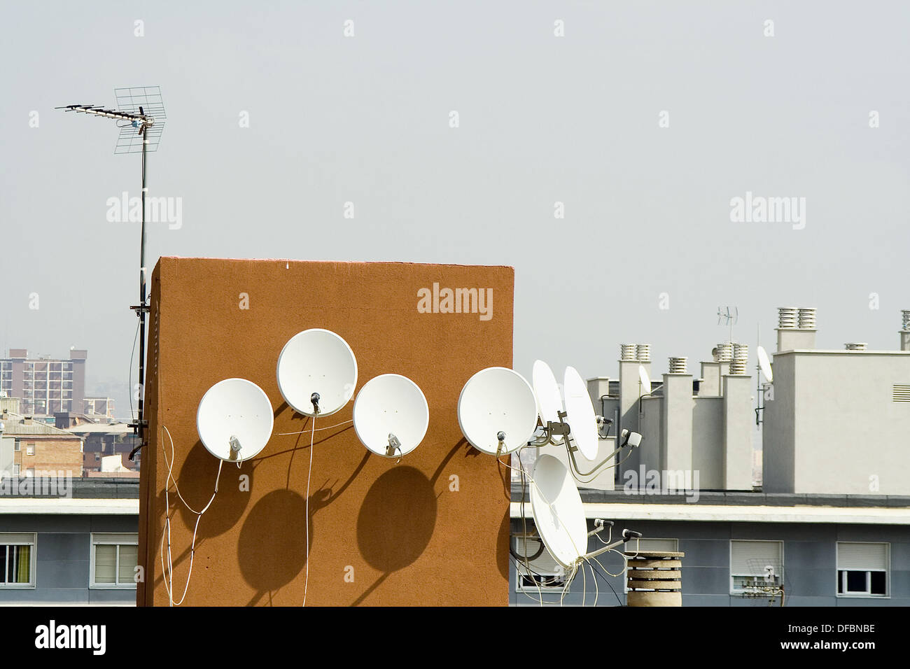 Satellite dish in apartments building Stock Photo Alamy