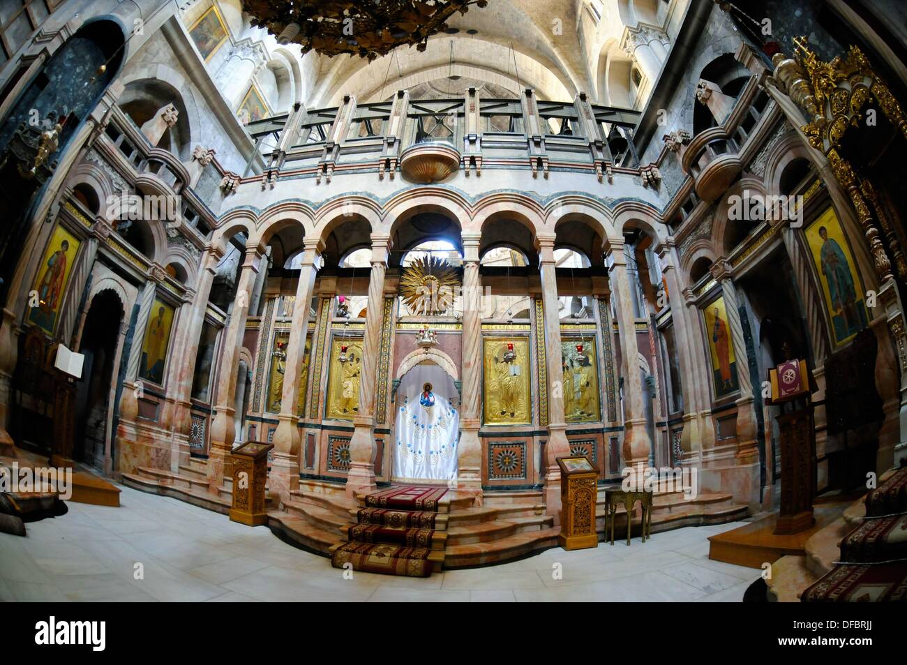 View of the chapel of the Church of the Holy Sepulchre, the supposed place of Jesus' grave and the last five stations of the Via Dolorosa, which is visited daily by thousands of pilgrims and tourists in Jerusalem, Israel, 10 September 2013. The Via Dolorosa (Way of Suffering) is a street in the old town of Jerusalem named after the path Jesus of Nazareth walked to his crucification. Jesus carried the cross, on which he later died via that road from the Antonia Fortress, then seat of Pilate, to Golgotha, the place where his grave is supposedly located. Above this place, the Church of the Holy S Stock Photo
