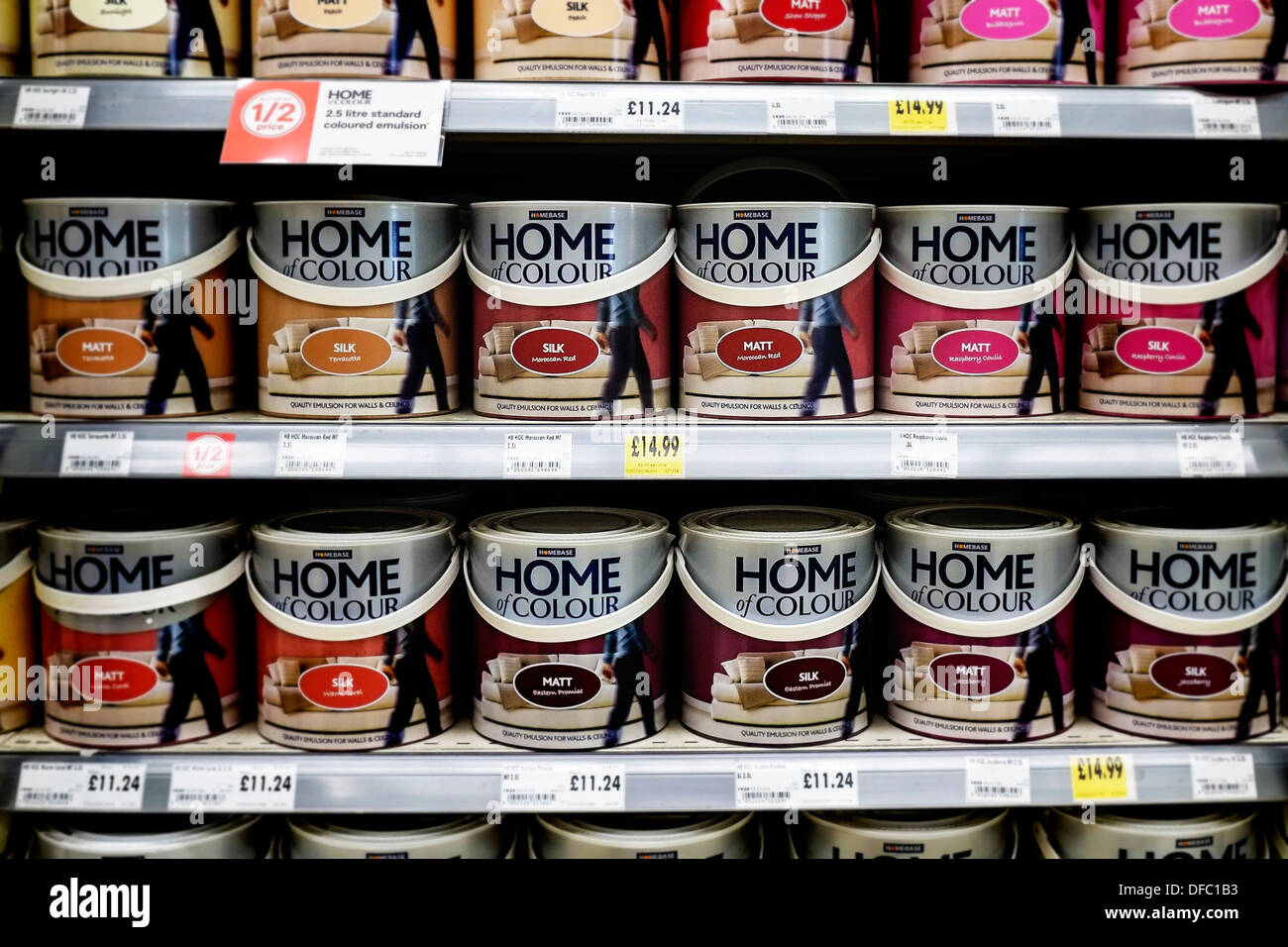 Shelves of tins of paint. Stock Photo