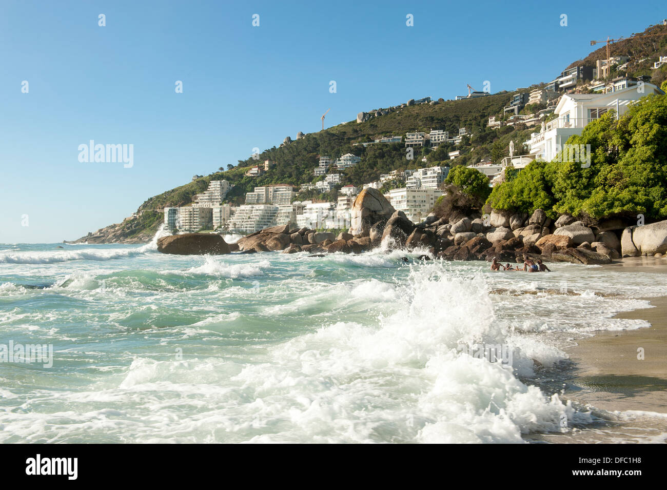 Residents enjoy swimming at Clifton 3rd beach, Cape Town, South Africa Stock Photo