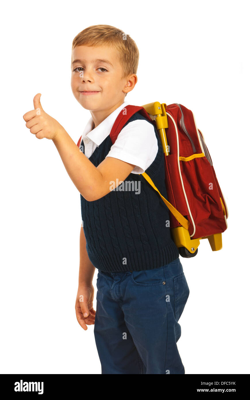 Schoolchild giving thumb up isolated on white background Stock Photo