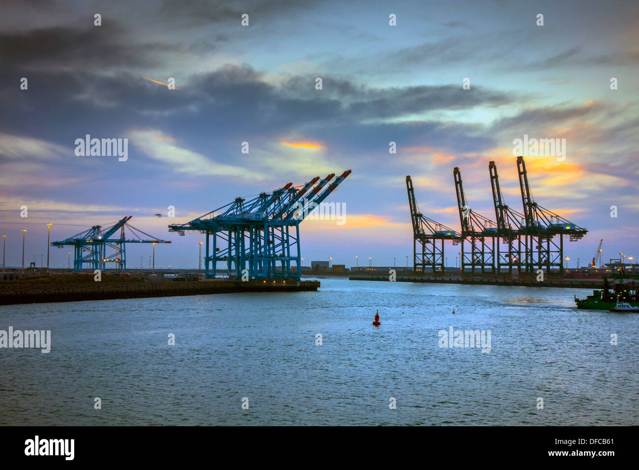 Zeebrugge port and container terminal, commerce, with ships, cranes and containers Stock Photo