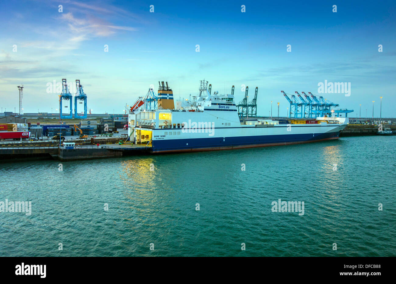Zeebrugge port and container terminal, commerce, with ships, cranes and containers Stock Photo