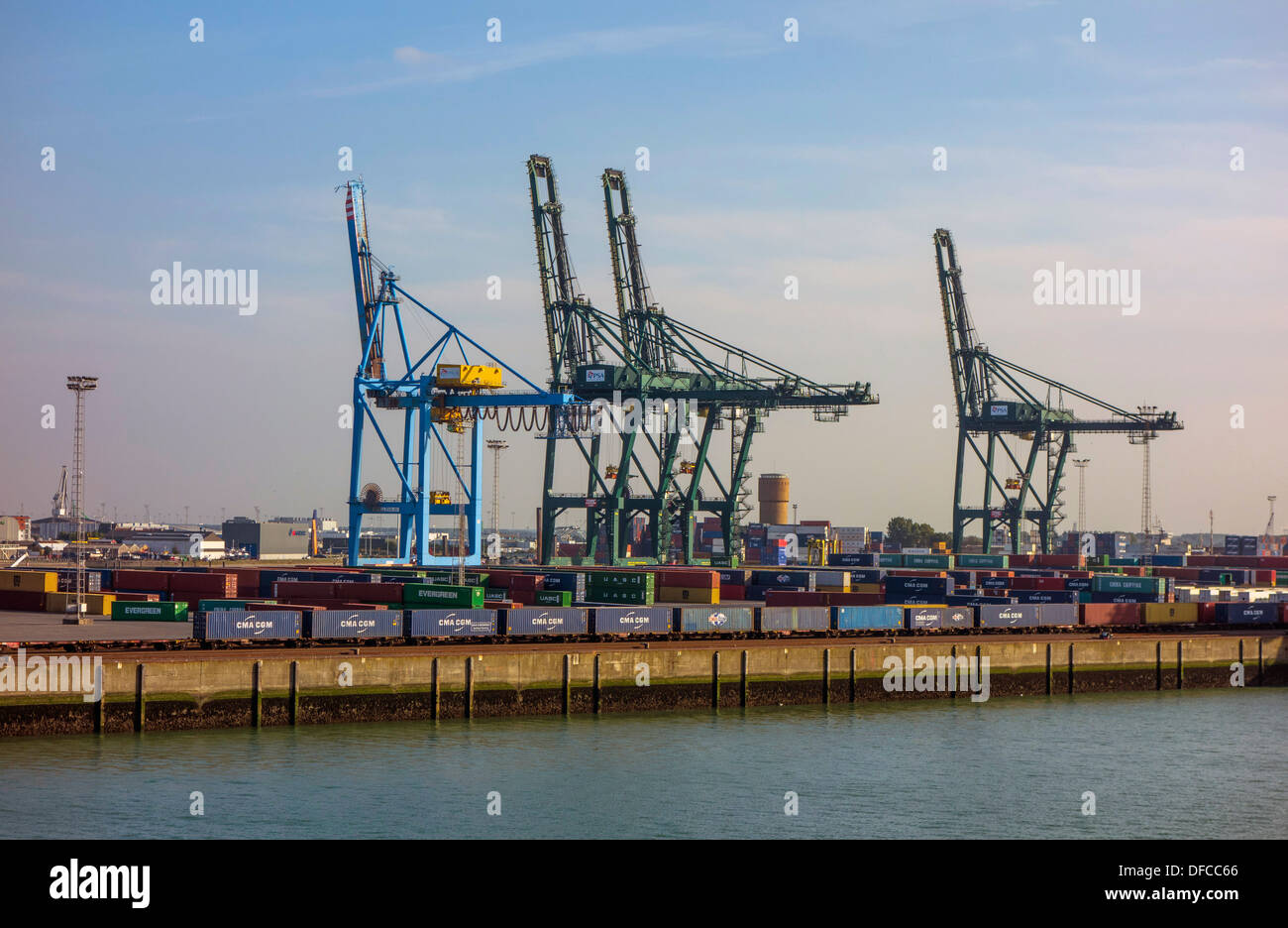 Zeebrugge port and container terminal, commerce, with ships, cranes and containers Stock Photo