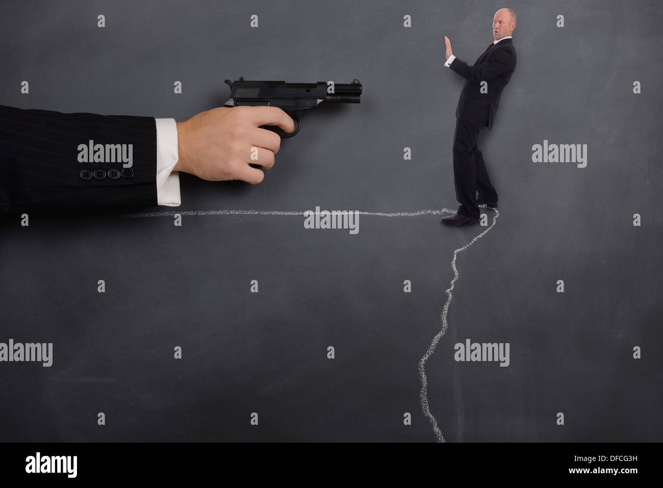 concept your fired businessman being pushed over the edge Stock Photo