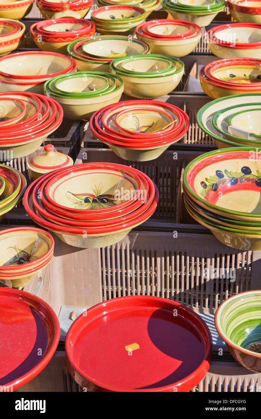 Pottery bowls on display at a market stall in Provence, South France