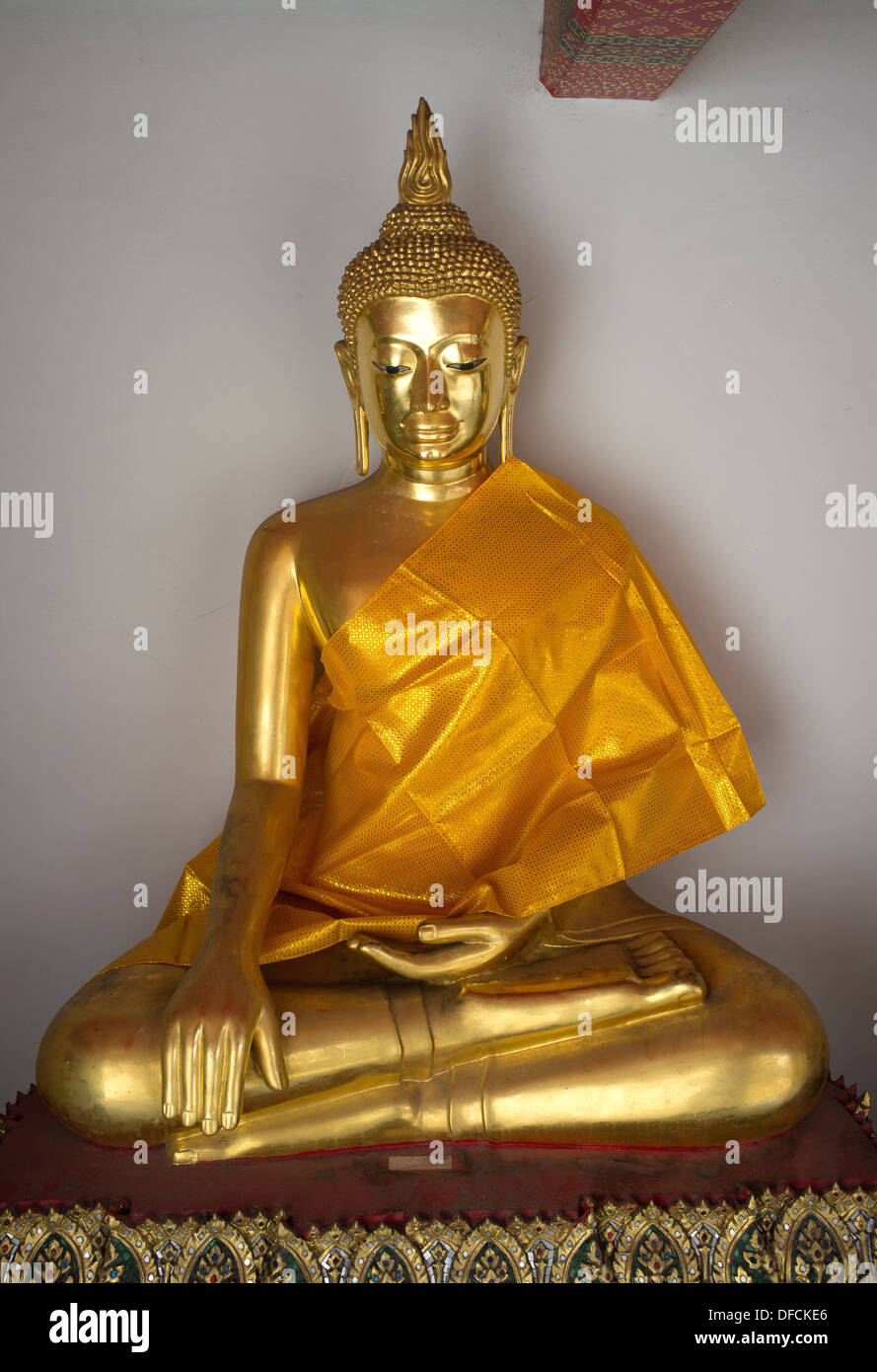 Gold statue of the Buddha reaching enlightenment, Bangkok Thailand Stock Photo