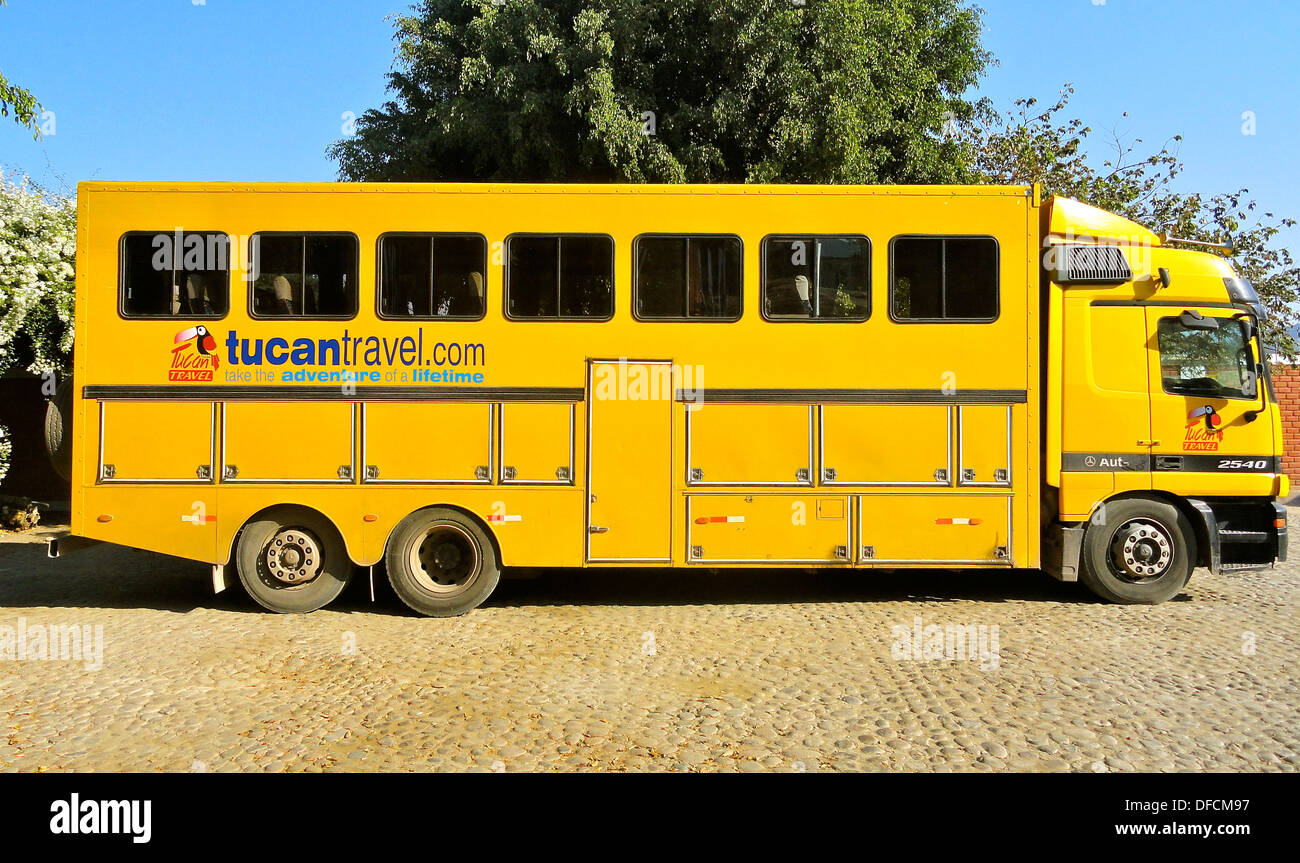 Tucan Travel tour bus in Nazca, Peru. These overland vehicles are custom Mercedes Actros trucks, with space for 32 passengers Stock Photo
