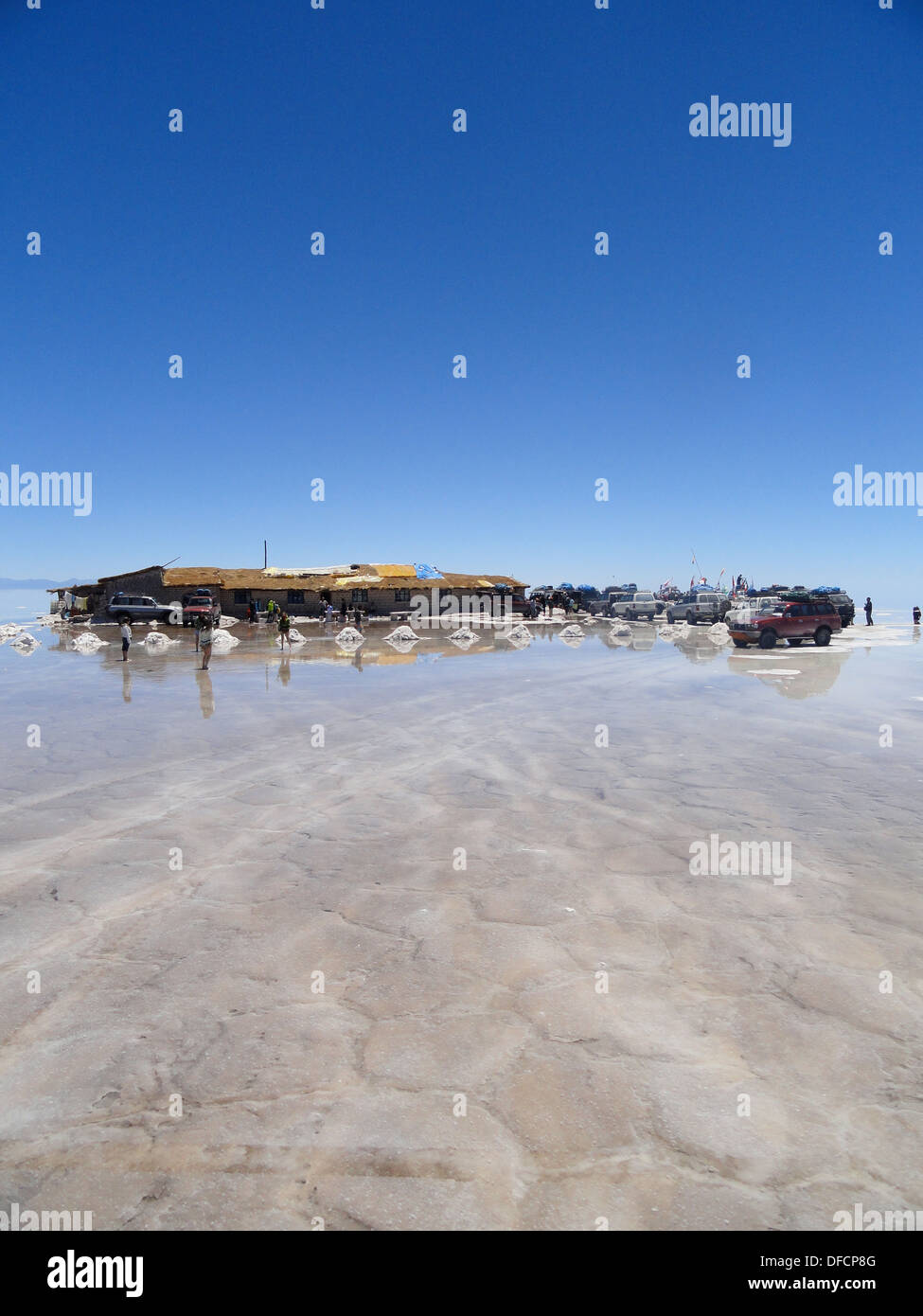 The Uyuni salt flats and salt hotel in rainy season. Salar de Uyuni, Bolivia Stock Photo
