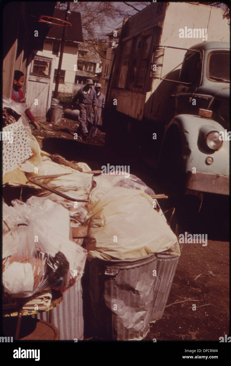 Communal Garbage A photograph showing garbage collection in an inner-city neighborhood ...