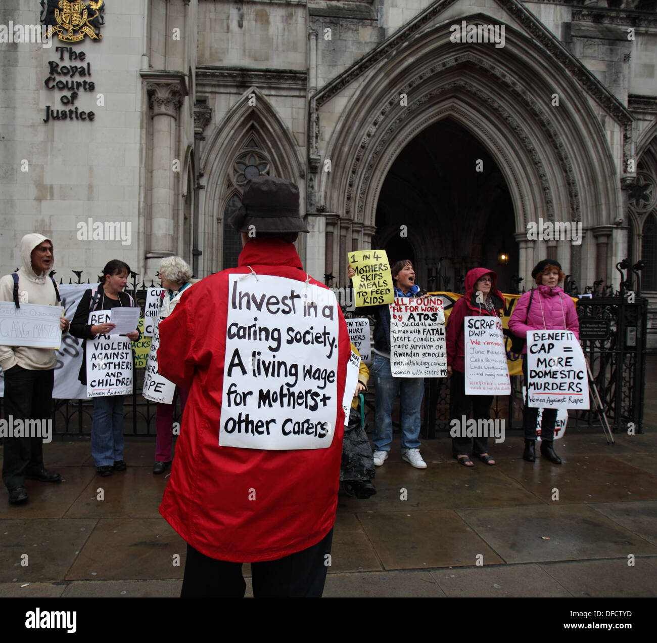 Protestors against the cuts and Bedroom Tax outside the High Court for a challenge to the Conservative Government's cutbacks England, UK Stock Photo