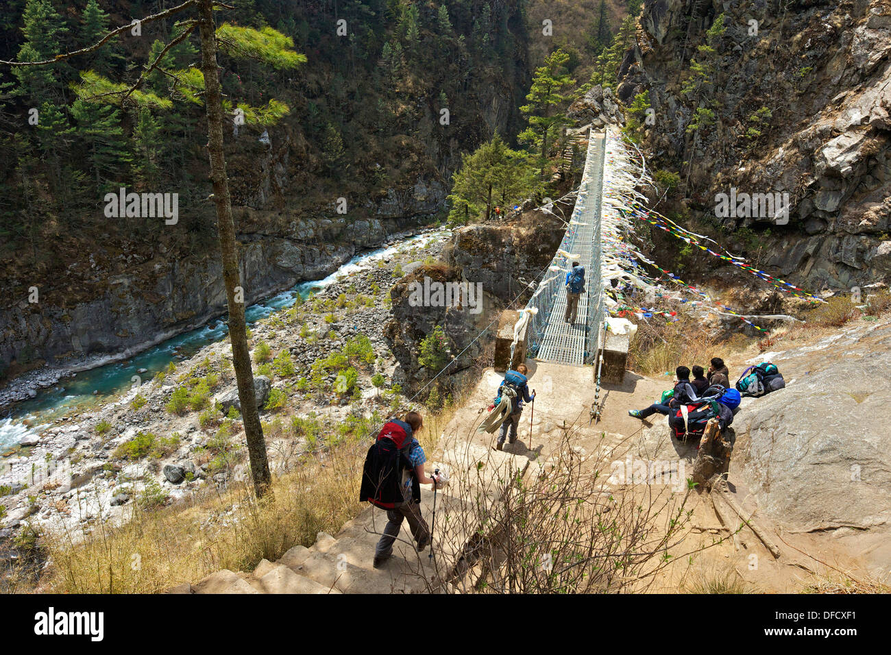 Suspension bridge crossing the Kyashar Khola, with Dudh Koshi river  between Phakding and Namche, Monjo, Everest Base Camp Trek, Stock Photo