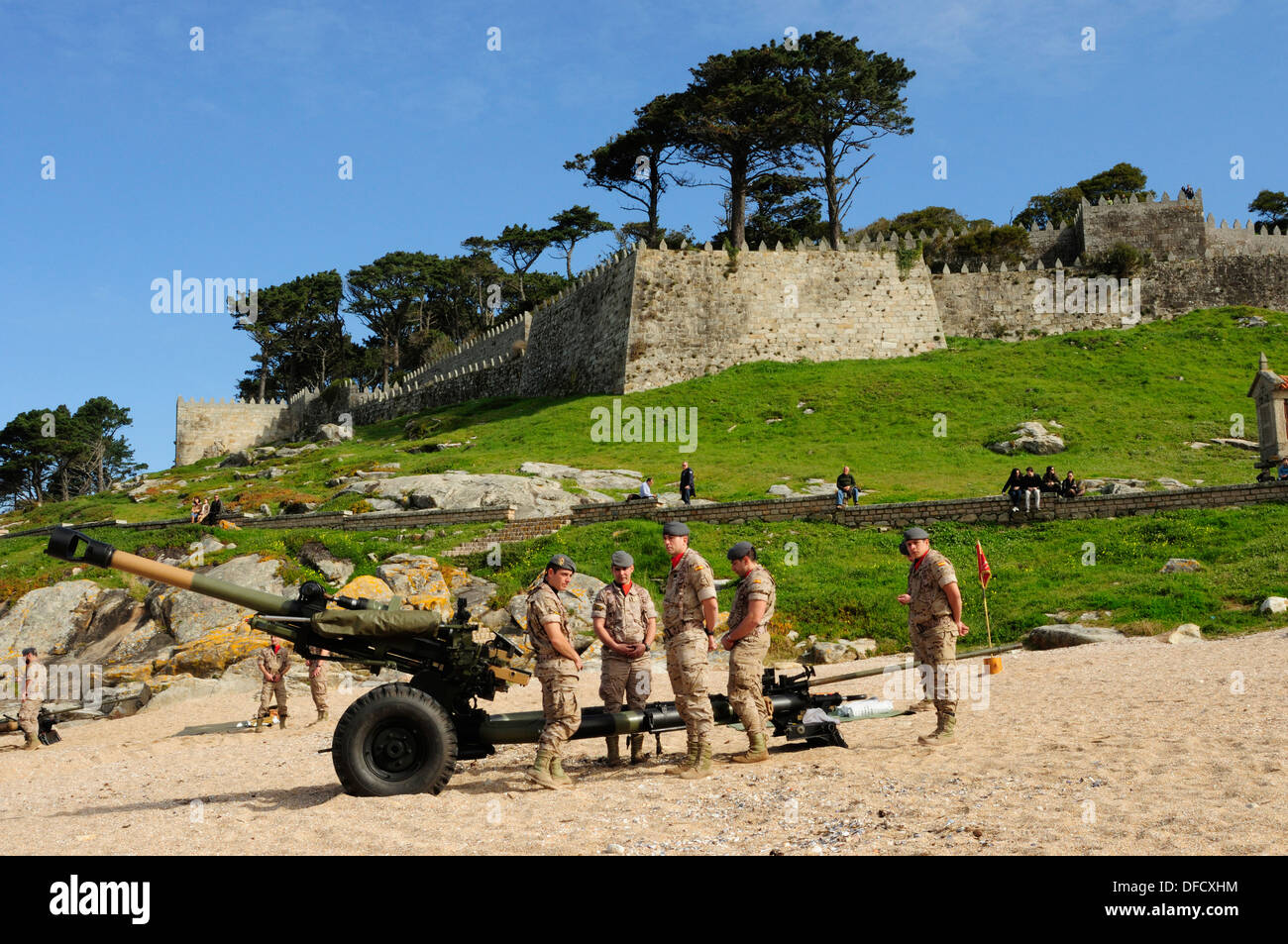 Group of soldiers prepared for a volley of gunfire during an exhibition. Baiona, Galicia, Spain Stock Photo