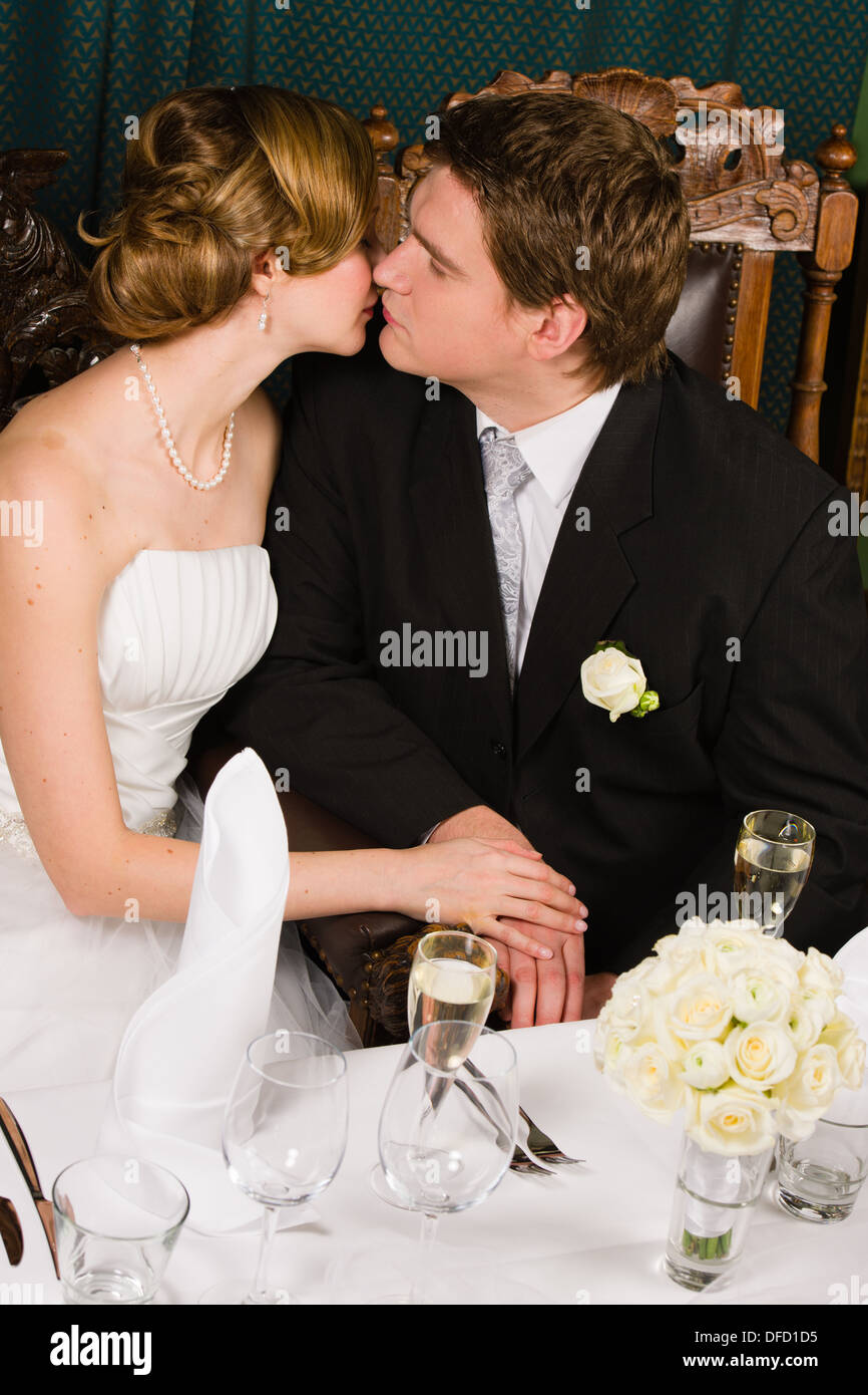 Romantic kiss bride and groom in wedding day Stock Photo - Alamy