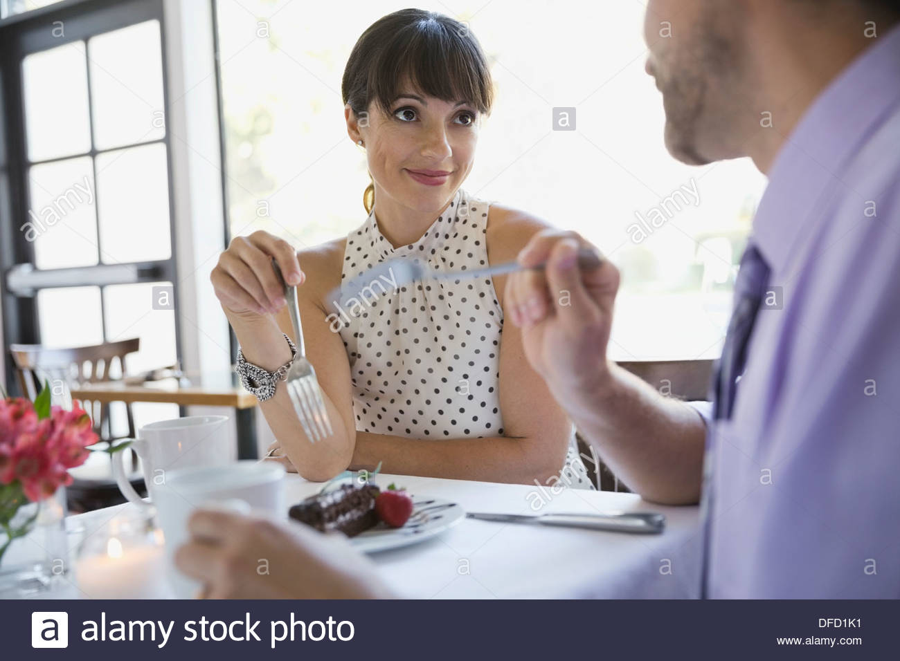 Professional couple dining out Stock Photo