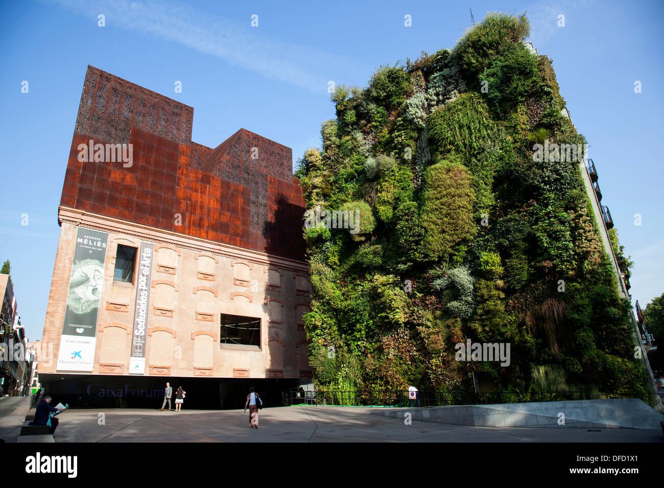 CaixaForum Museum and culture center, constructed by the Swiss architects Herzog & de Meuron next to the 'Green Wall' by Patrick Stock Photo