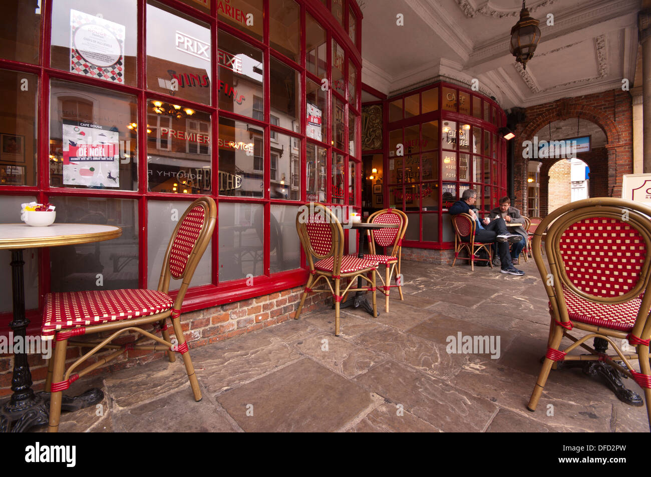 Tables Chairs and Customers at the Front Of A Cafe Rouge UK Stock Photo