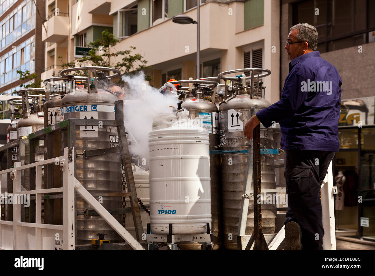 Liquid nitrogen escaping from a metal canister on the back of an Air Liquide delivery truck in Santa Cruz de Tenerife. Stock Photo
