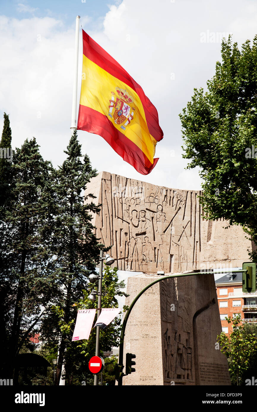 Spanish Flag at Columbus Monument by Joaquín Vaquero Turcios, Plaza de Colón, Madrid Spain Stock Photo