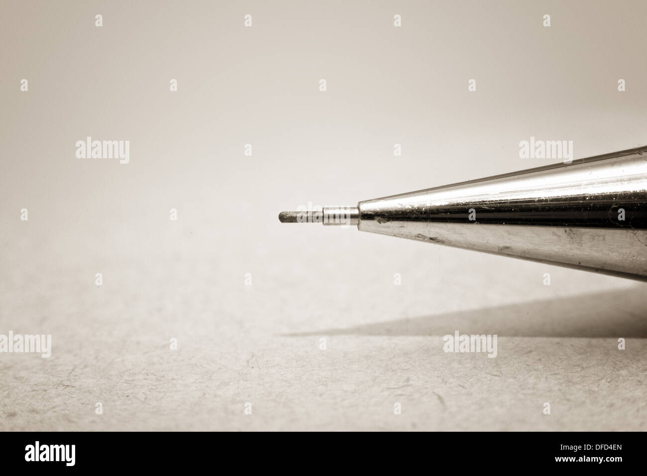 Tip of sharp mechanical pencil on paper Stock Photo