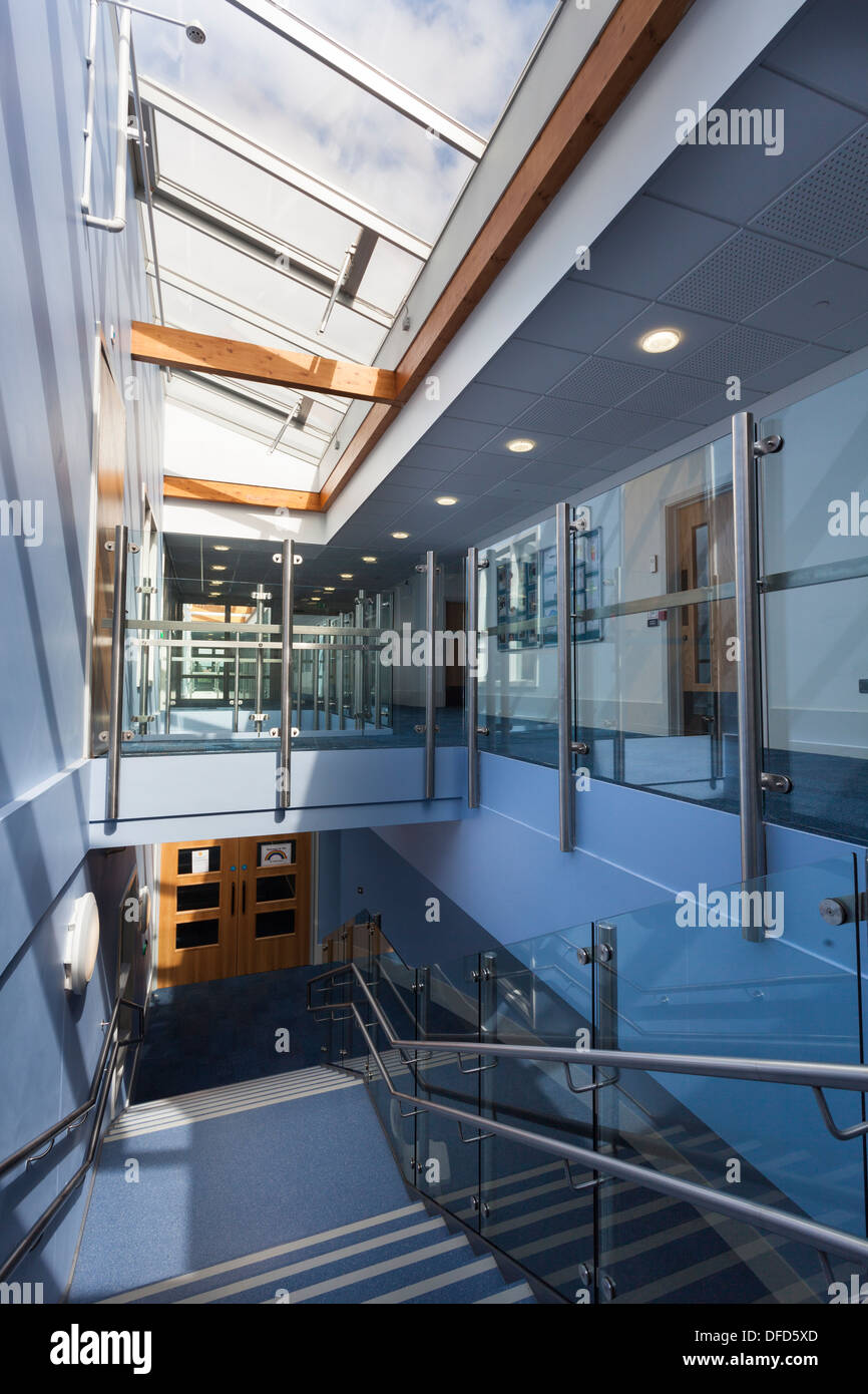 school corridor with staircase down to lower level Stock Photo