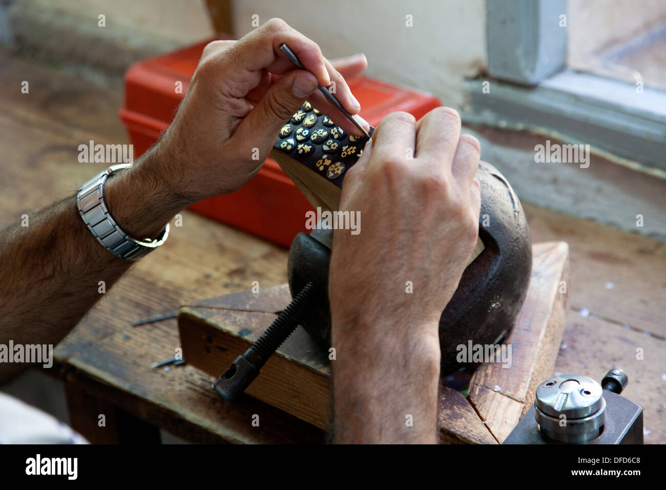 Jeweler working at his bench in Toledo, Spain. Stock Photo