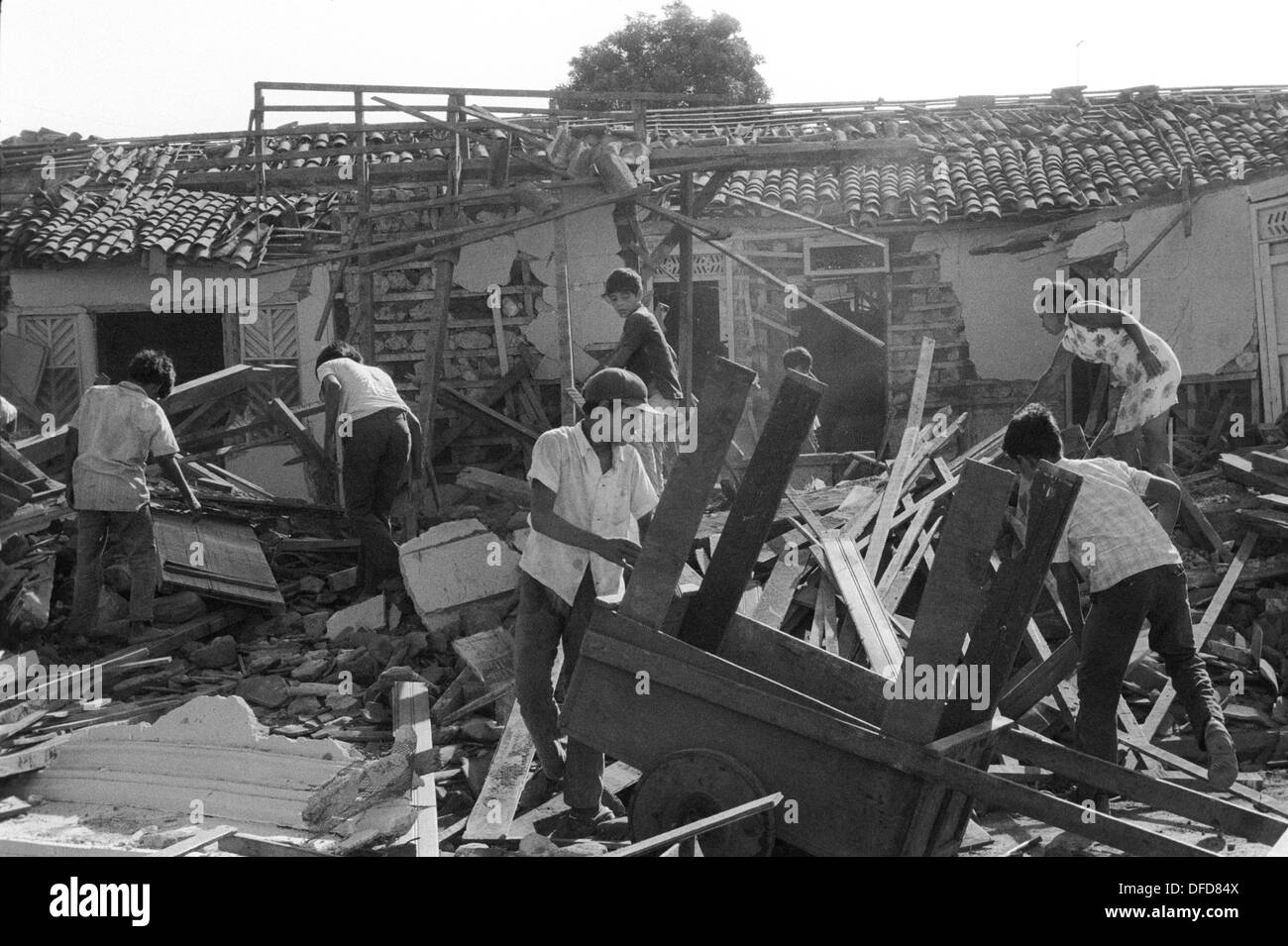 Earthquake damage Managua Nicaragua 1972. Sorting through remains of shops and homes after an earthquake. 1970s HOMER SYKES Stock Photo