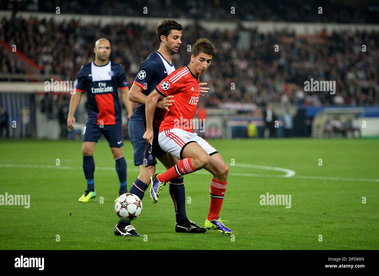 Paris, France. 02nd Oct, 2013. UEFA Champions League group stages.  Paris St Germain  versus Sporting Club of Benfica .  Thiago Motta (psg) and Filip Djuricic (ben) Credit:  Action Plus Sports Images/Alamy Live News Stock Photo