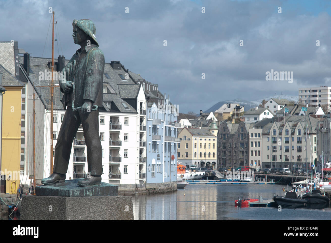 Detail of a fisherman sculpture in the port of Alesund, Norway Stock ...