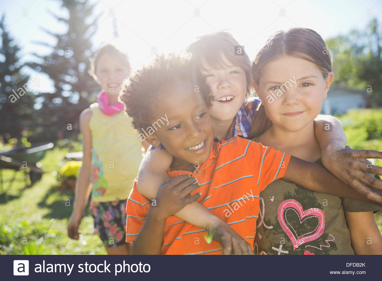 Playful children in community garden Stock Photo