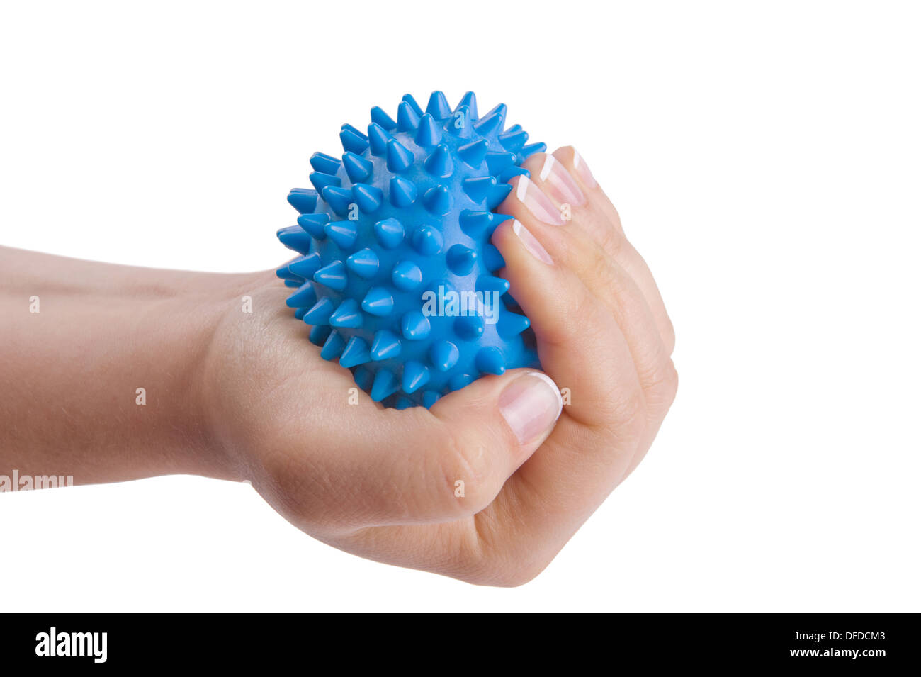 Woman's hand with Spiny plastic blue massage ball isolated on white Stock Photo