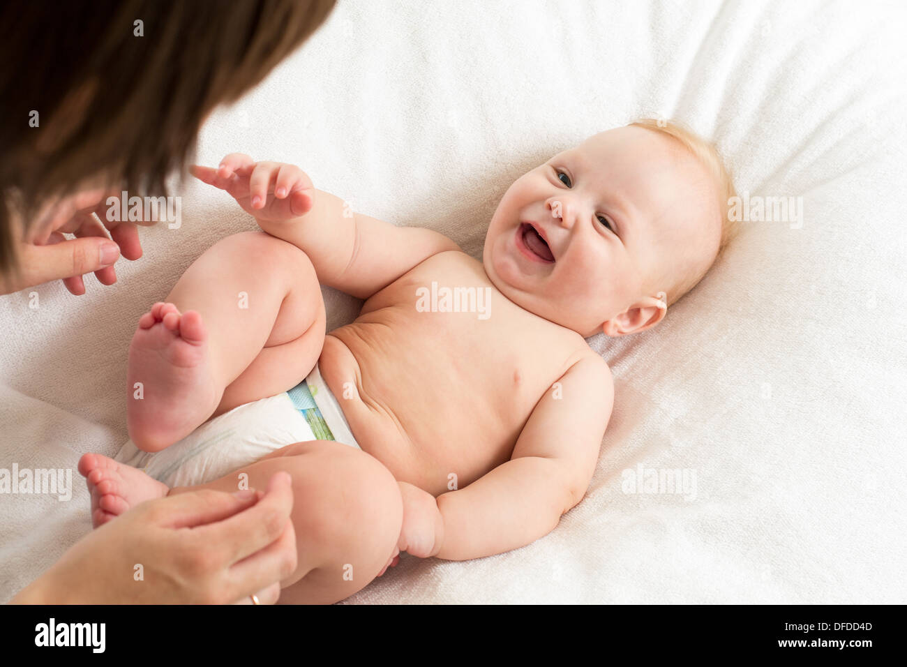 happy mother having fun with her baby boy infant Stock Photo