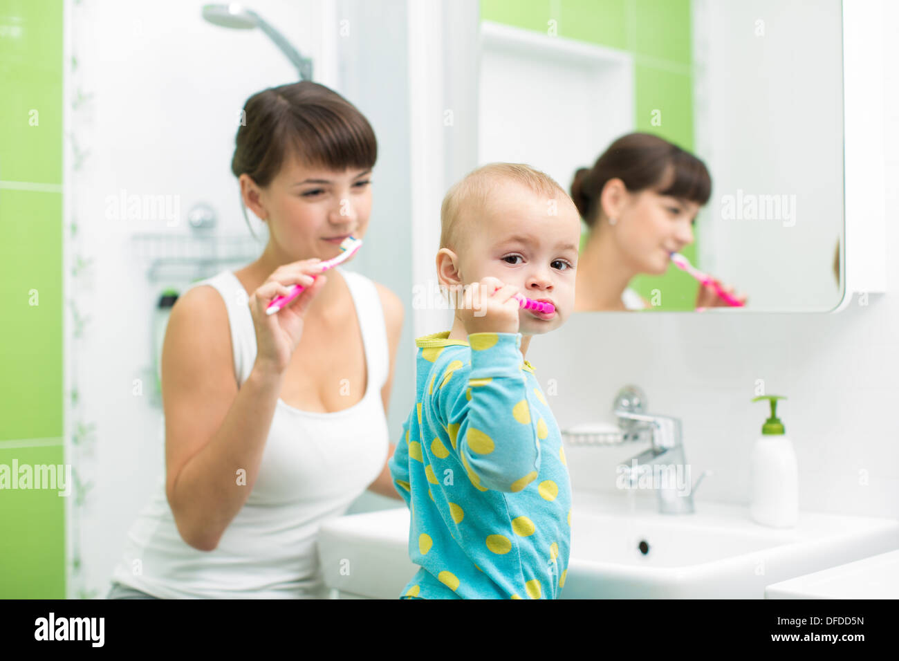 Baby brushing her teeth hires stock photography and images Alamy