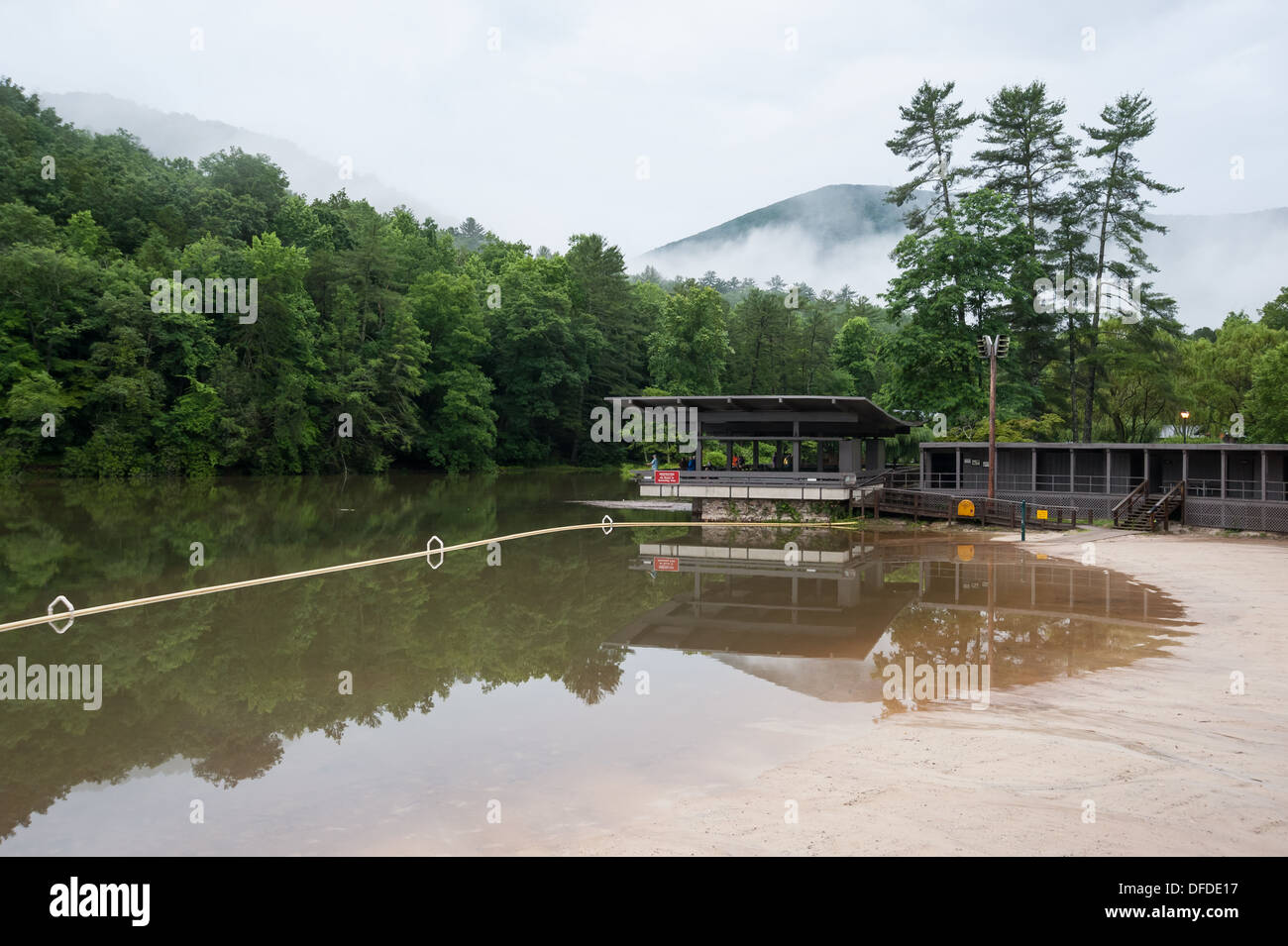 People relaxing and fishing from the pavillion as clouds hang low in the mountains surrounding beautiful Vogel State Park. Stock Photo