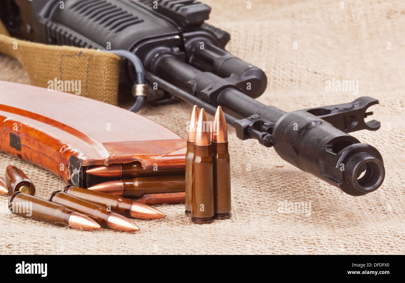 background with the cartridges and the AK47 Stock Photo