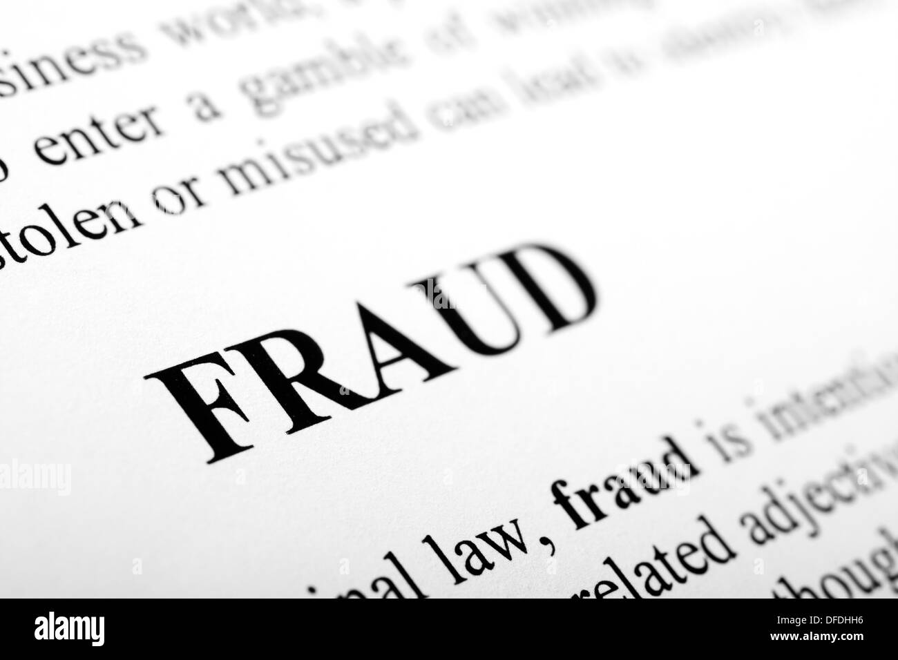 The word fraud shot with artistic selective focus. Stock Photo