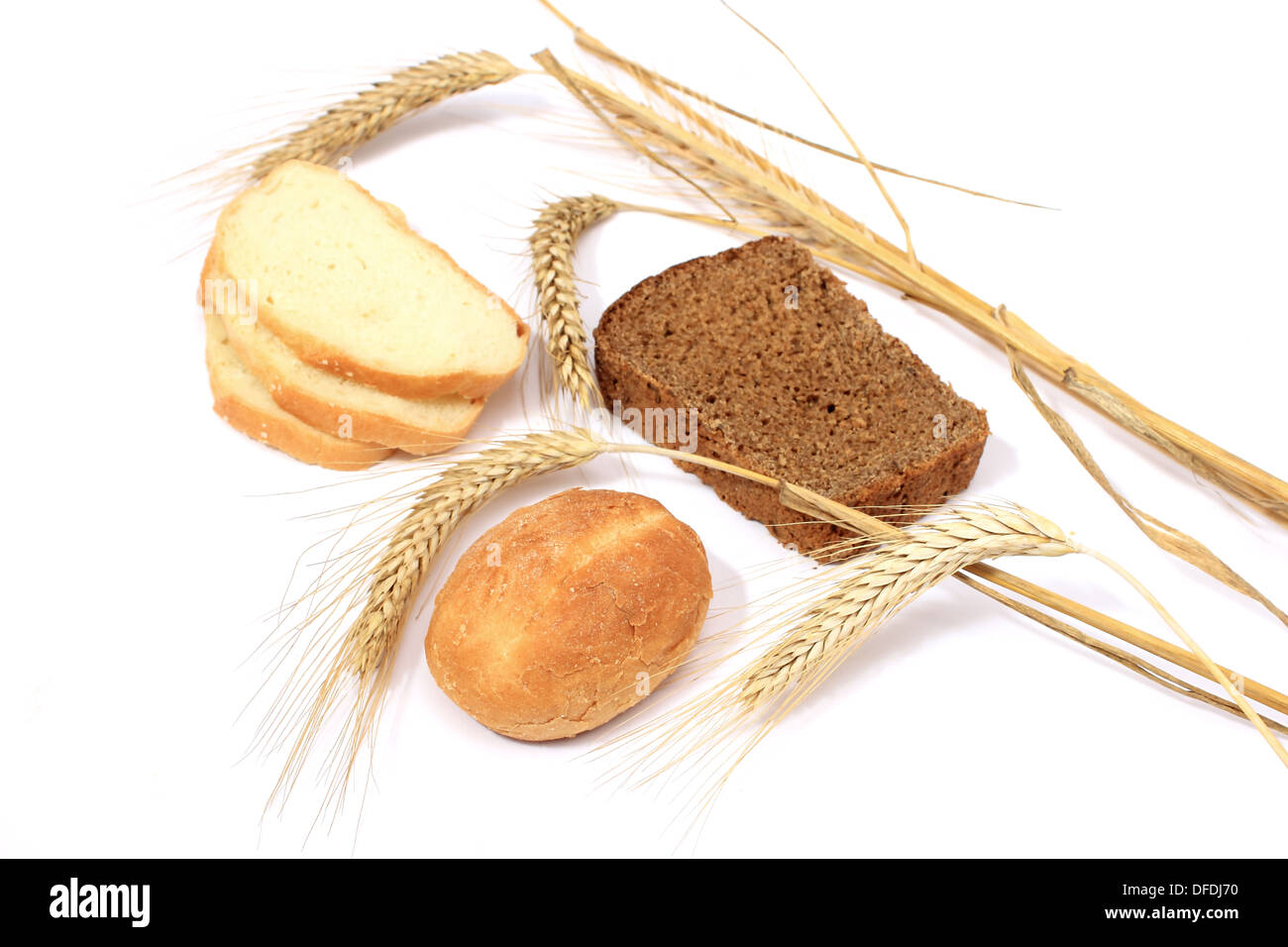 Bread bun and stalks of wheat on a white background, Хлеб булочки и стебли колоски пшеницы на белом фоне Stock Photo