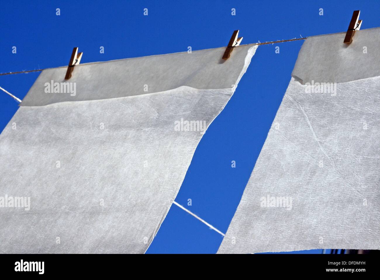 handmade paper drying in the sun Stock Photo Alamy