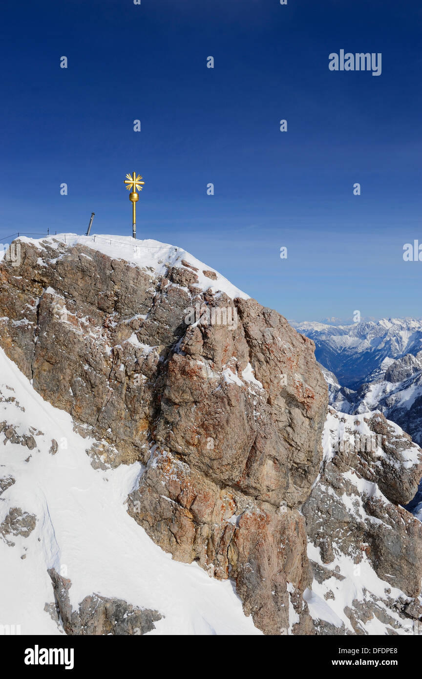 Germany, Bavaria, View of summit cross at  Zugspitze Mountain Stock Photo