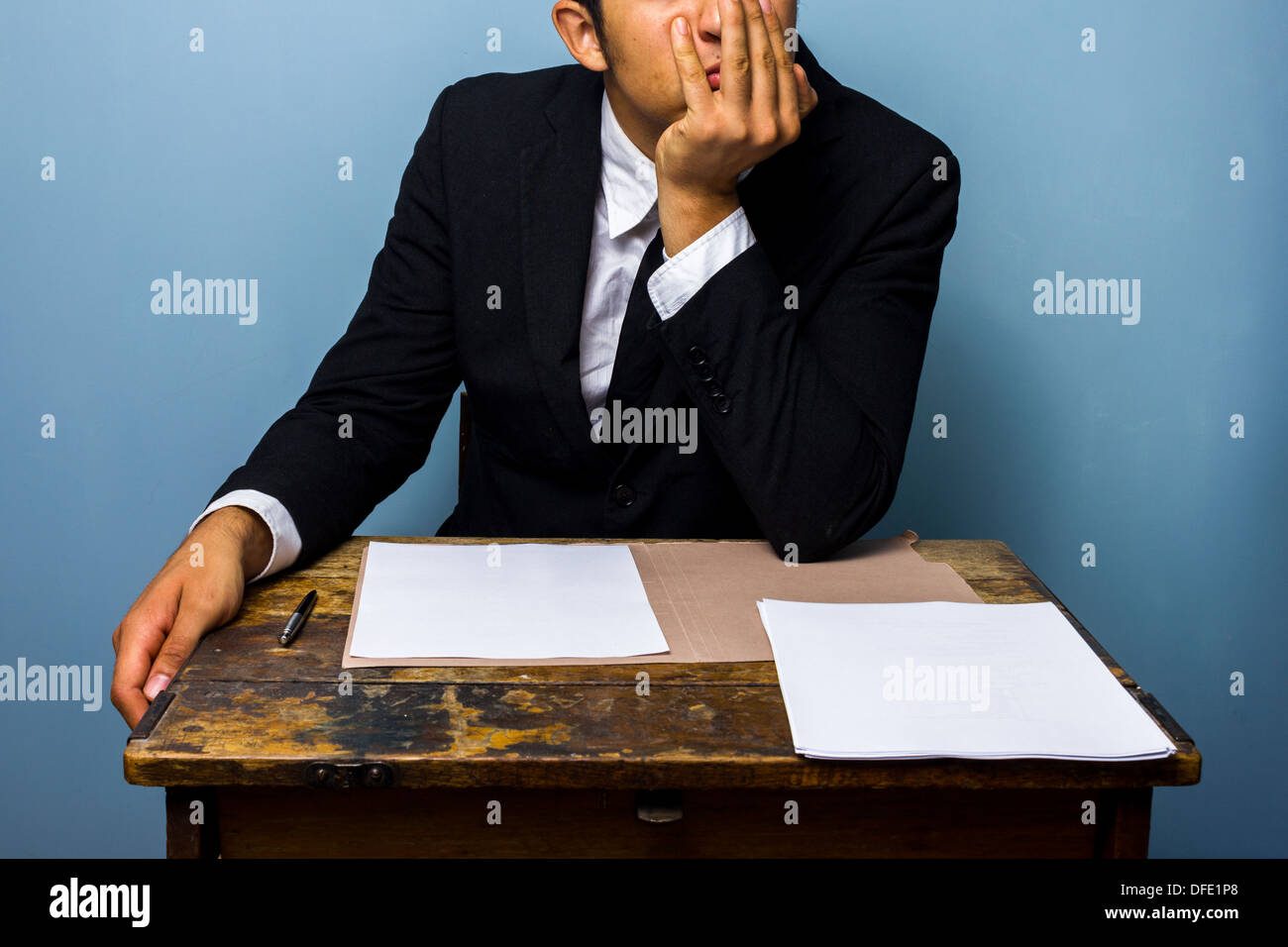 Young businessman is bored Stock Photo